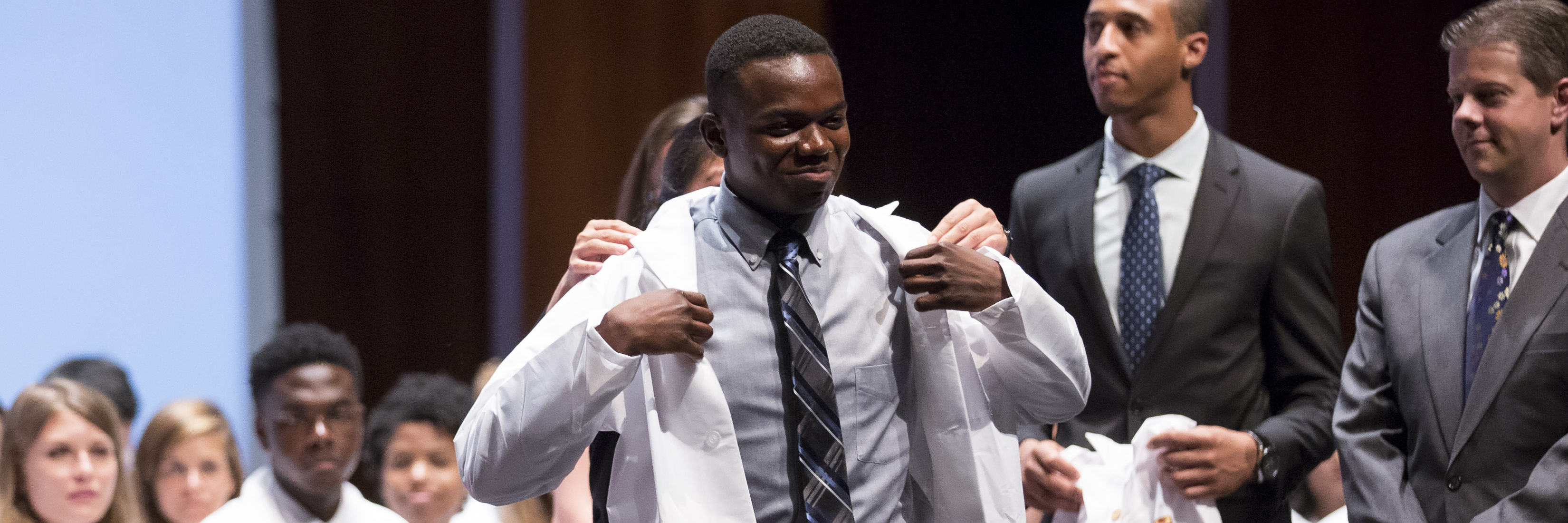 Medical student at white coat ceremony